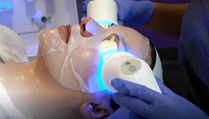LED light therapy over a hydrating mask during the Glacé Facial Experience