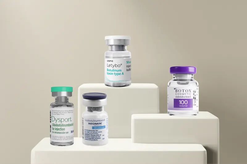 Dysport, Xeomin, Letybo and Botox neurotoxin vials displayed on pedestals